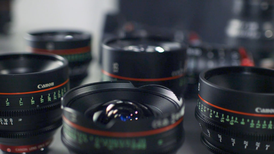 Cover illustration for camera lens buying guide with a lineup of primes and zooms across focal lengths
