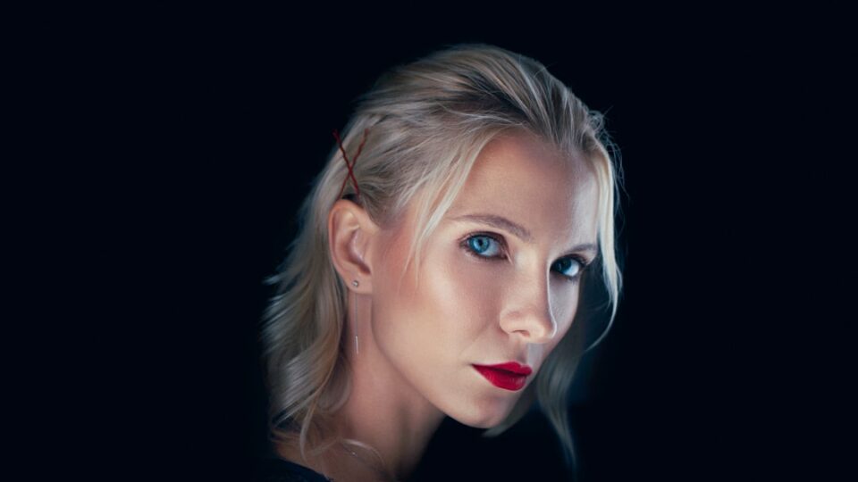 Cover illustration: portrait retouching in Photoshop concept with layers, masks, and subtle color swatches